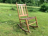 Three-quarter view of entire rocking chair on grass