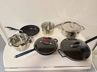 Overall view of all cookware pieces displayed together