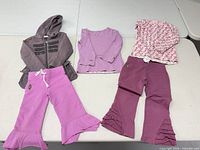 Front view of all five garments laid out