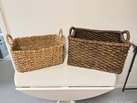 Both baskets top view showing colors, shapes and handles