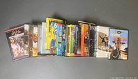 All 21 DVD cases arranged in a row, front covers visible