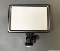 Front view of Luxpad22 LED panel with mount attached