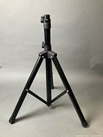 Full view of speaker stand folded open at mid height