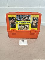 Front view showing Mork & Mindy decal and orange body