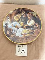 Front of collector plate showing illustration and gold rim
