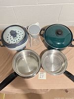 All items in lot including saucepans, steamer insert, stockpot with lid, electric steamer, carafe