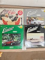 Front covers of all four sealed LPs