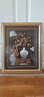 full view of framed 3D embossed floral artwork