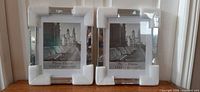 Two new Meetart mirrored frames with foam corner protectors