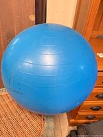 Full view of blue stability ball showing color and size