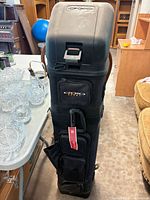 Full view of Ogio black wheeled golf travel case