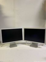 Front view of both Apple Cinema Display monitors side by side