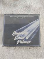 Front of jewel case with album cover