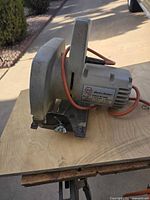 Side view of Black & Decker corded circular saw showing body, motor label and power cord