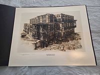 Full view of signed print in presentation folder