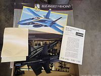 Outer box, instruction sheet and kit contents overview