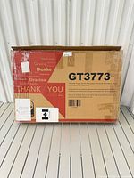 Front of Costway GT3773 boxed mini greenhouse showing model number
