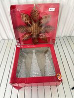 Boxed set showing woven star and boxed trees