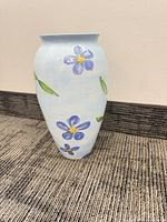 full view showing shape, floral pattern, glaze finish