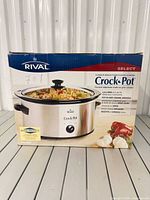 Front view of boxed Rival Select Crock-Pot 4.5 qt slow cooker