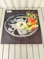 Retail box showing platter with food, brand visible