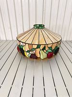 Full view of Tiffany-style stained glass fruit motif lamp shade