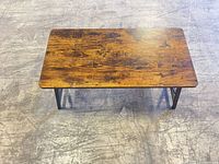 Top view showing wood veneer surface and overall shape