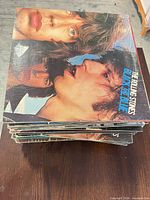 Stack of LPs with Rolling Stones Black and Blue on top