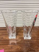 Front view showing both crystal vases and overall design