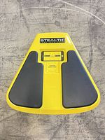 Top view showing Stealth balance board, yellow deck with black pads