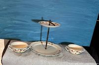 Dessert stand, oval platter, two cream soup bowls