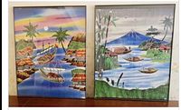 Both framed batik pictures side by side