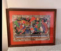 Front view of framed barkcloth painting