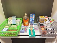 Full lot showing two baskets filled with assorted bath and body items