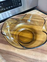 Amber ruffled bowl on counter