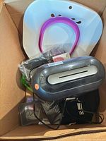 Lot contents inside shipping box