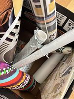 Box with assorted rolled wallpapers and vinyls plus framed print