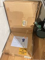 Carton showing label for blue chair