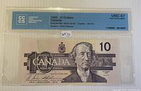 Front of CCCS-graded 1989 $10 note showing holder label and note obverse.