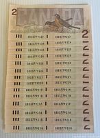 Front view showing obverse and sequential serials
