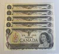 Front view showing five sequential 1973 $1 notes