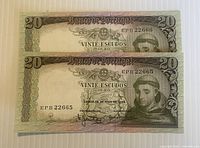 Front view of both 20 Escudos banknotes showing design, date, and serial numbers