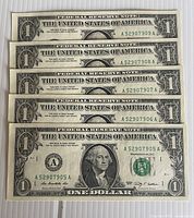 Front view of five sequential 2009 $1 notes