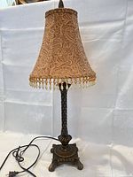 Full view of lamp with cord and shade