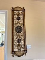 Full view of vertical metal wall panel mounted on wall