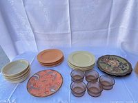 Full lot showing plates, bowls and ramekins