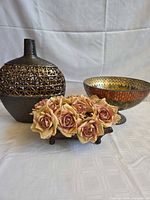 Group shot of vase, mosaic bowl and rose arrangement