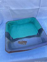 overall view of square turquoise/teal stoneware platter
