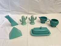 group shot of all eight ceramic pieces