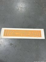 Full view of the embossed colour etching on paper
